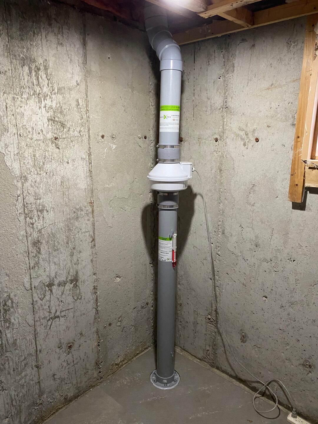 Installation d'un système d'atténuation de radon avec un ventilateur de modèle 1